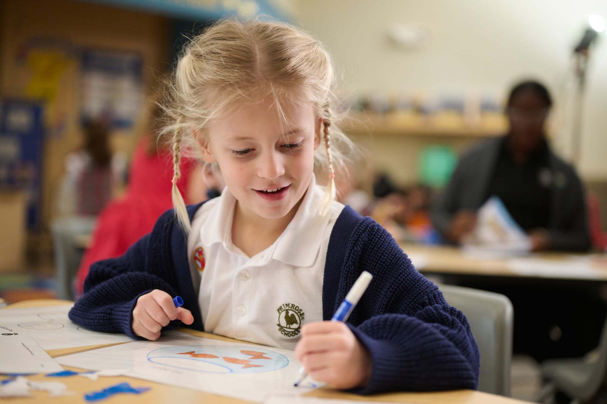 A girl taking notes in class